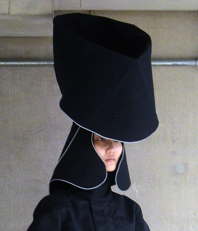 headwear evolved to function as a rainwater collection tool 4