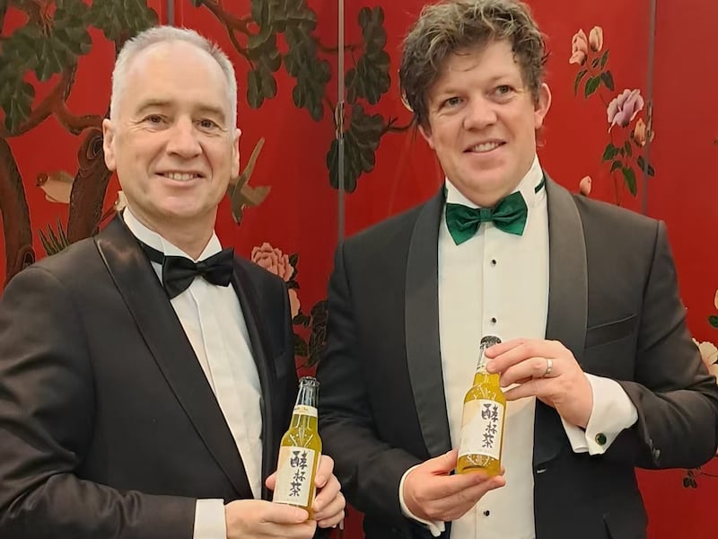 Ireland’s ambassador to China, Nicholas O’Brien (left) and Ian Lahiffe launching Just Be Cha kombucha at the Irish Ball in Beijing